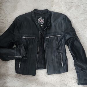Black Leather Jacket with Zipper Details